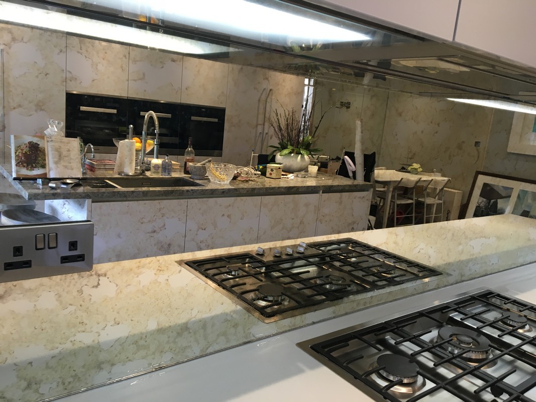 Mirror glass splashback in Clapham luxury kitchen